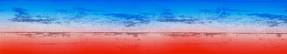 USA Independence Day abstract background with in red and blue colors. Toned vintage wood. 4th of July, Veterans Day, Memorial Day with copy space for design. Web banner. Website header.