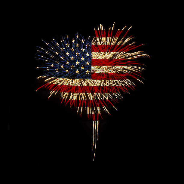 Independence day. My heart with love to usa. fireworks in a heart shape with the U.S. flag on a black background fourth of july fireworks stock pictures, royalty-free photos & images