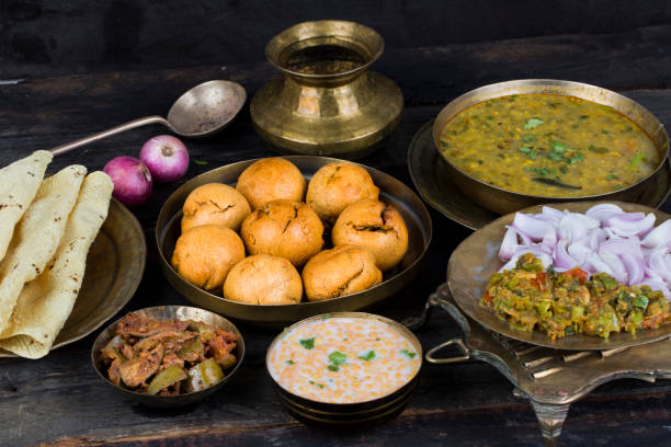 Indian Cuisine Dal Baati Indian Cuisine Dal Baati, It is Popular in Rajasthan, Uttar Pradesh and Madhya Pradesh rajasthan stock pictures, royalty-free photos & images