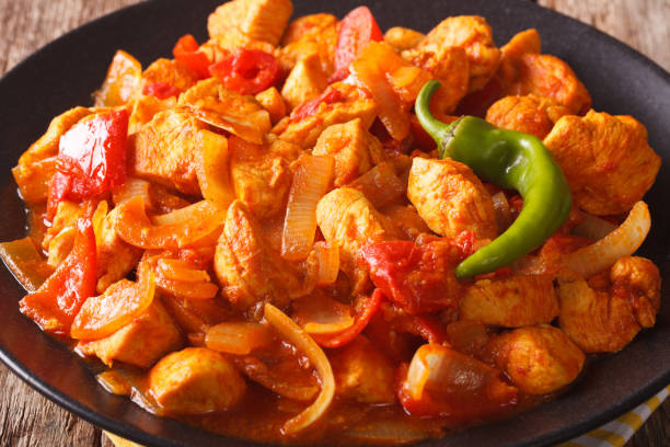 Popular Indian curry Chicken Jalfrezi, chicken stir fried with...