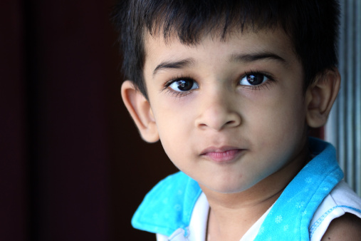 Indian Cute Boy Looking At The Camera Stock Photo - Download Image Now ...