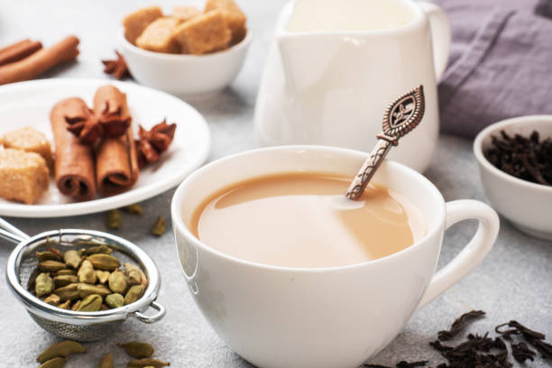 Indian drink masala tea with milk and spices. Cardamom sticks cinnamon star anise cane sugar. Indian drink masala tea with milk and spices. Cardamom sticks cinnamon star anise cane sugar bengali sweets stock pictures, royalty-free photos & images