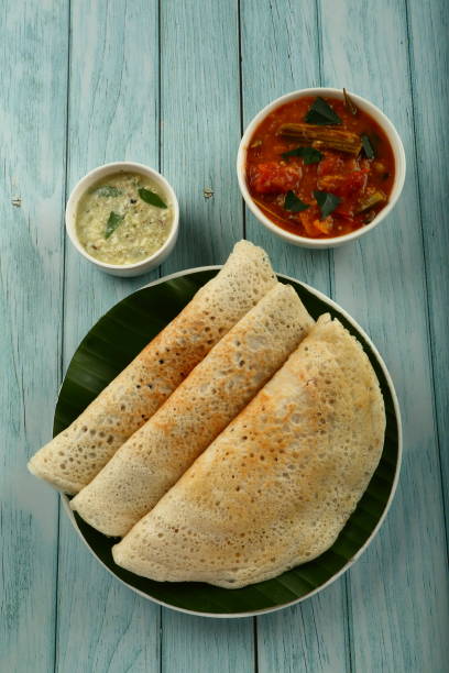 Indian masala dosa, thosai. Homemade delicious masala dosai stuffed with potatoes and spices. thosai stock pictures, royalty-free photos & images