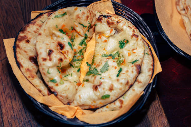 Indian naan bread This image shows Indian naan bread. naan bread stock pictures, royalty-free photos & images