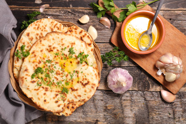 indian naan bread indian naan bread naan bread stock pictures, royalty-free photos & images