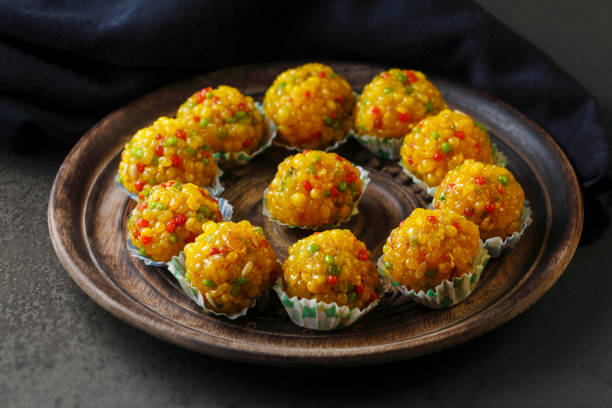 Indian sweet Laddu Laddu also know as laddoo, ladoo, laddo are ball-shaped sweets popular in the Indian festivals. Laddu are made of flour, minced dough and sugar with other ingredients. mithai stock pictures, royalty-free photos & images