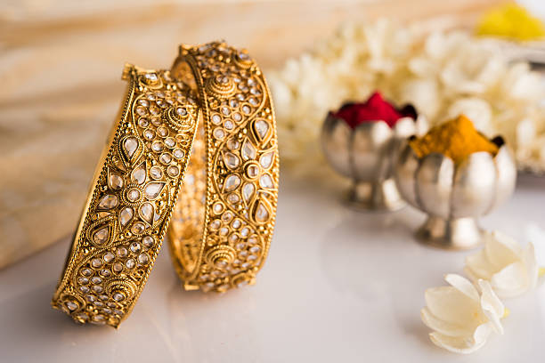Indian traditional jewellery, bangles with huldi kumkum Indian traditional jewellery, bangles with huldi kumkum indian jewelry stock pictures, royalty-free photos & images
