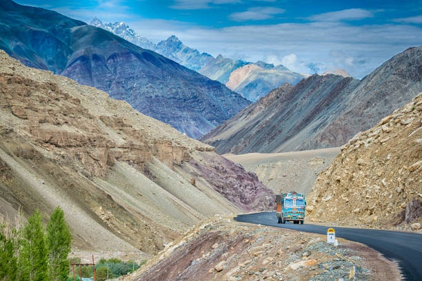 Indian truck on the Srinagar-Leh highway in Ladakh, India Indian truck on the Srinagar-Leh highway in Ladakh, India. This road, also called Indian National Highway, crosses seveal high mountain passes, the most wellknown are Fatu La (4.100 m) and Zoji La (3.528 m altitude). srinagar stock pictures, royalty-free photos & images