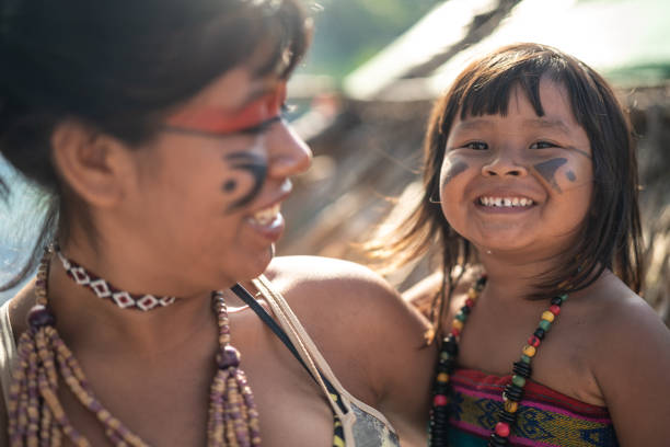 Indigenous Brazilian Sisters Portrait from Tupi Guarani Ethnicity Beautiful shooting of how Brazilian Natives lives in Brazil south american culture stock pictures, royalty-free photos & images
