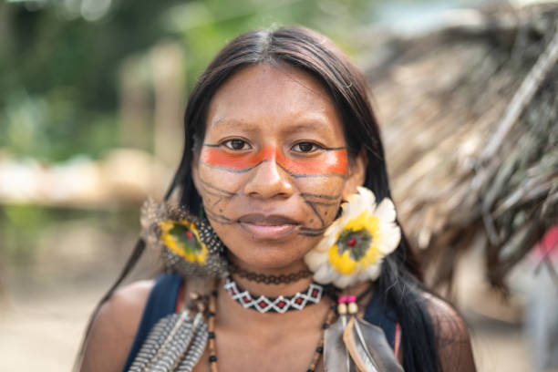 Indigenous Brazilian Young Woman, Portrait from Guarani Ethnicity Beautiful shooting of how Brazilian Natives lives in Brazil pardo brazilian stock pictures, royalty-free photos & images