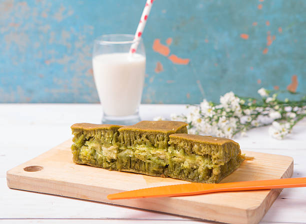 Indonesian Sweet Giant Pancake, green tea flavour with cheddar cheese stock photo