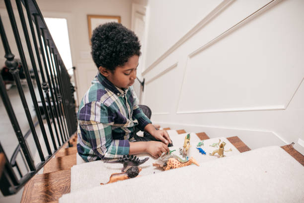 indoor speeltuinen met leuk speelgoed - dinosaur trees stockfoto's en -beelden