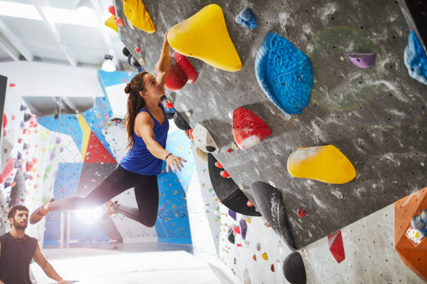 Indoor wall climbing and bouldering extreme sports Indoor wall climbing and bouldering extreme sports.
Made in Barcelona indoor climbing gym with expert climbers. bouldering stock pictures, royalty-free photos & images