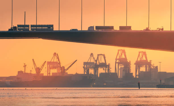 industrial docklands skyline at dusk on the Yarra river, Melbourne stock photo