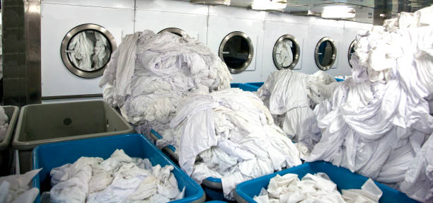 industrial laundry machines stock photo