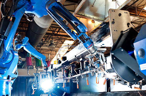 Industrial Robot Industrial Robot machines stock pictures, royalty-free photos & images