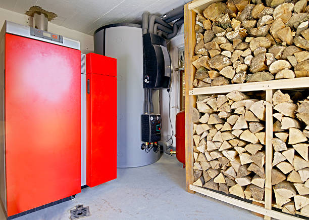 Industrial storeroom with large rack of firewood stock photo