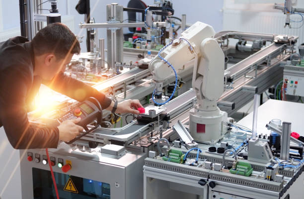 industry 4.0 concept: robot programming stock photo