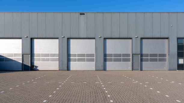 Industry units warehouse with shutter doors stock photo