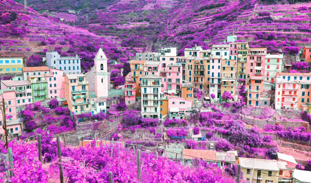 infrared landscape of Manarola village Cinque Terre Italy stock photo
