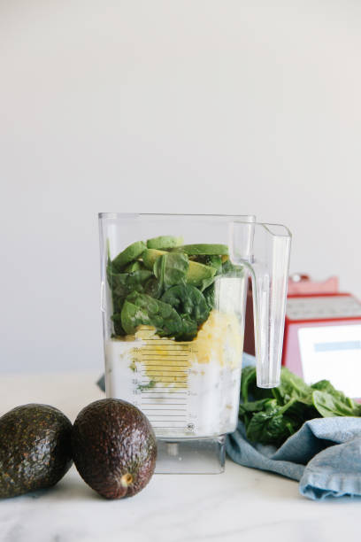 Ingredients for an avocado green smoothie stock photo