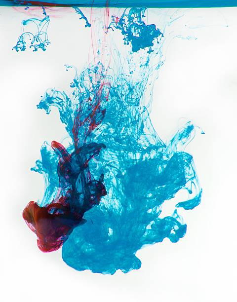 Inks in water, color abstraction stock photo