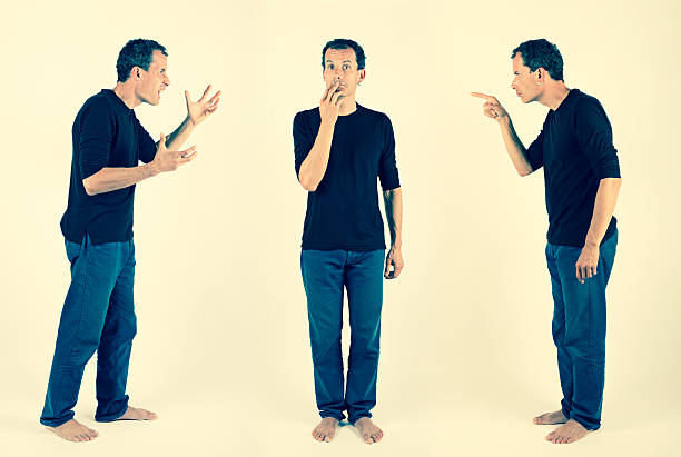 inner conflict of different personalities different personalities discussing inside a man  mime artist stock pictures, royalty-free photos & images