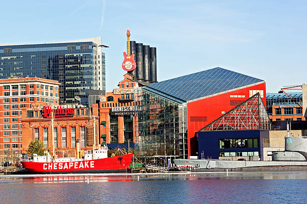 Inner Harbor of Baltimore, Pier 3. Baltimore, USA - January 31, 2014: The Lightship Chesapeake and the USS Torsk submarine docked in front of the National Aquarium. inner harbor baltimore stock pictures, royalty-free photos & images