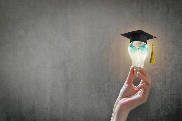 Innovative learning, creative educational study concept for graduation and school student success with world lightbulb on teacher chalkboard Innovative learning, creative educational study concept for graduation and school student success with world lightbulb on teacher chalkboard education building stock pictures, royalty-free photos & images