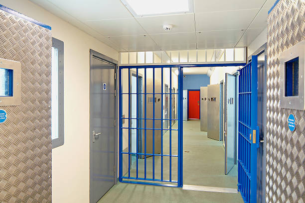 Inside of a modern prison with open doors stock photo