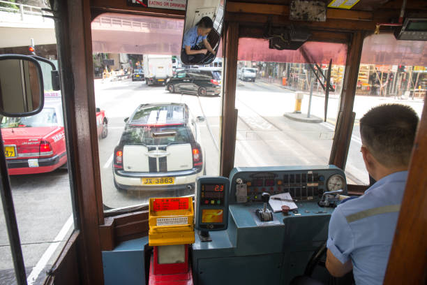 Inside view Tram or Ding Ding at exit door with payment system in traffic. stock photo