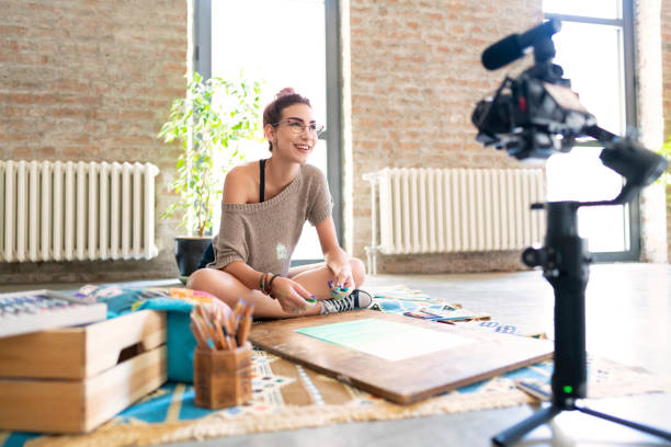 Inspiration is only a vlog away Beautiful female artist recording her video tutorial. live draw sdy stock pictures, royalty-free photos & images