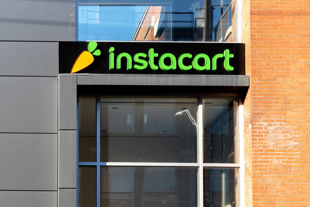 Instacart company closeup sign is seen in Toronto, Canada. stock photo
