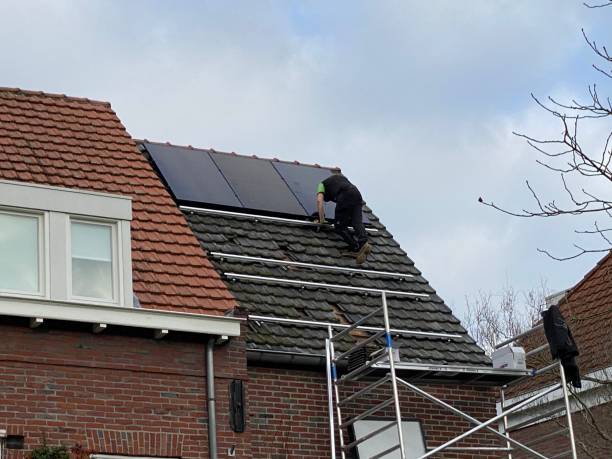 Installing  solar panels stock photo