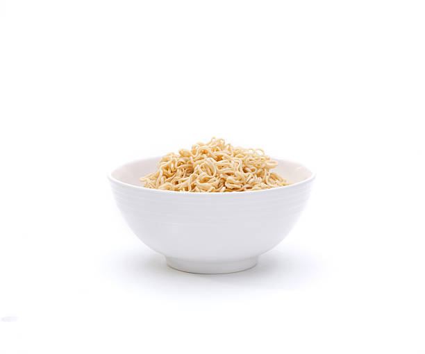 Instant noodle in a bowl isolated on white stock photo