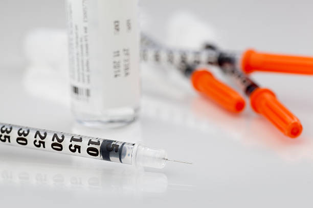 Insulin syringes stock photo