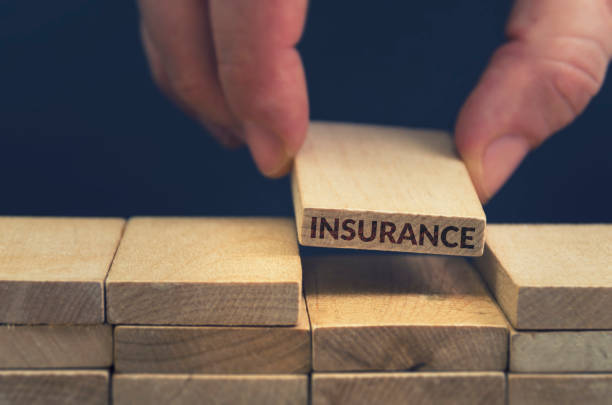 Insurance Insurance word written on wood block insurance stock pictures, royalty-free photos & images