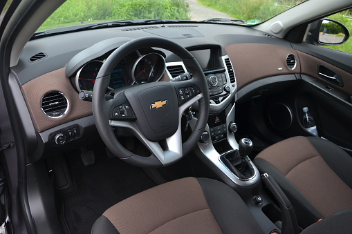 Munich, Germany – 2nd July, 2012: Interior in Chevrolet Cruze vehicle. This model was revealed in 2008.