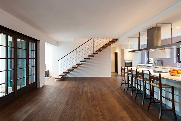 Interior modern loft Beautiful modern loft, view of the kitchen hardwood floor stock pictures, royalty-free photos & images