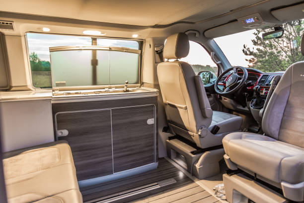Interior of modern Volkswagen Multivan California Ocean (Transporter T6).  Kitchen inside the car stock photo