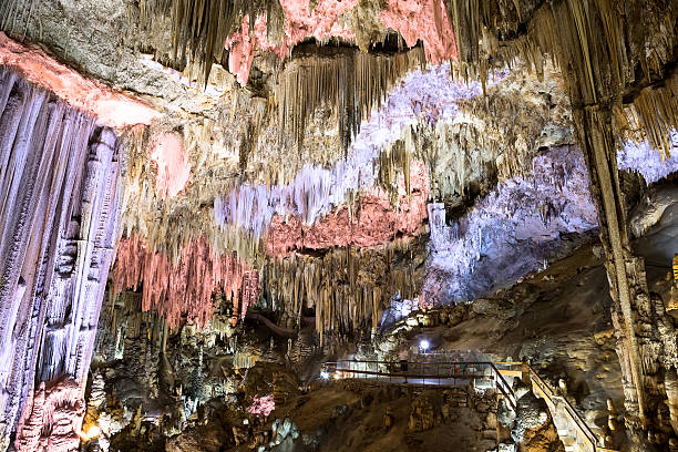 Interior of Natural Cave in Andalusia, Spain Interior of Natural Cave in Andalusia, Spain -- Inside the Cuevas de Nerja are a variety of geologic cave formations which create interesting patterns nerja stock pictures, royalty-free photos & images
