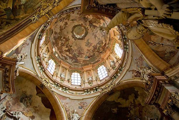 Interior of St. Nicholas Church in Prague stock photo