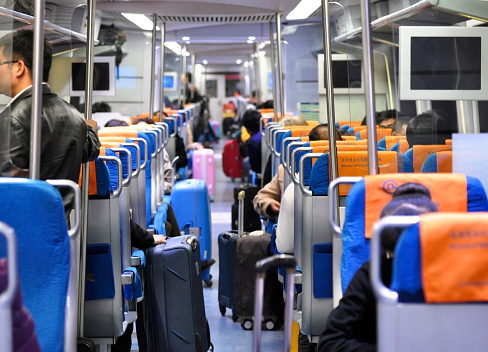 Interior of the Airport express train with luggage and passengers in Beijing in China