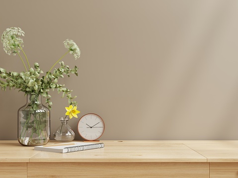 Interior wall mock up with flower vase,dark brown wall and wooden shelf.3D rendering