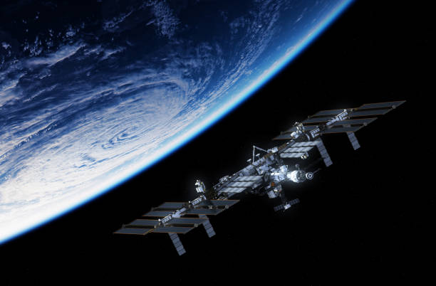 International Space Station Orbiting Planet Earth International Space Station Orbiting Planet Earth. 3D Illustration. international space station stock pictures, royalty-free photos & images