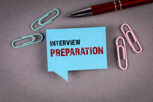 Interview Preparation. Blue speech bubble with text on a gray office desk stock photo