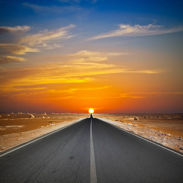 Into the Sun  dead end road stock pictures, royalty-free photos & images