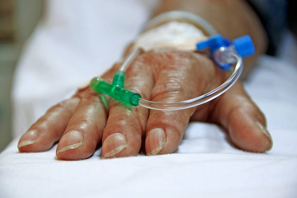 Intravenous blood infusion  infusion therapy stock pictures, royalty-free photos & images