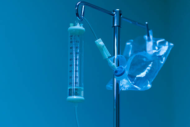 Intravenous fluids  infusion therapy stock pictures, royalty-free photos & images