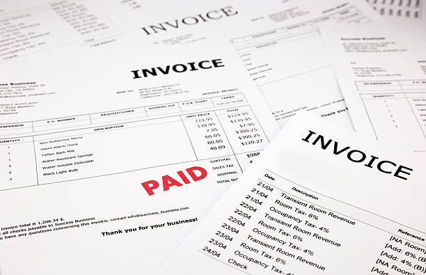 Invoices and bills with paid stamp difference invoices and bills with red paid stamp, concept and ideas paid stamp stock pictures, royalty-free photos & images